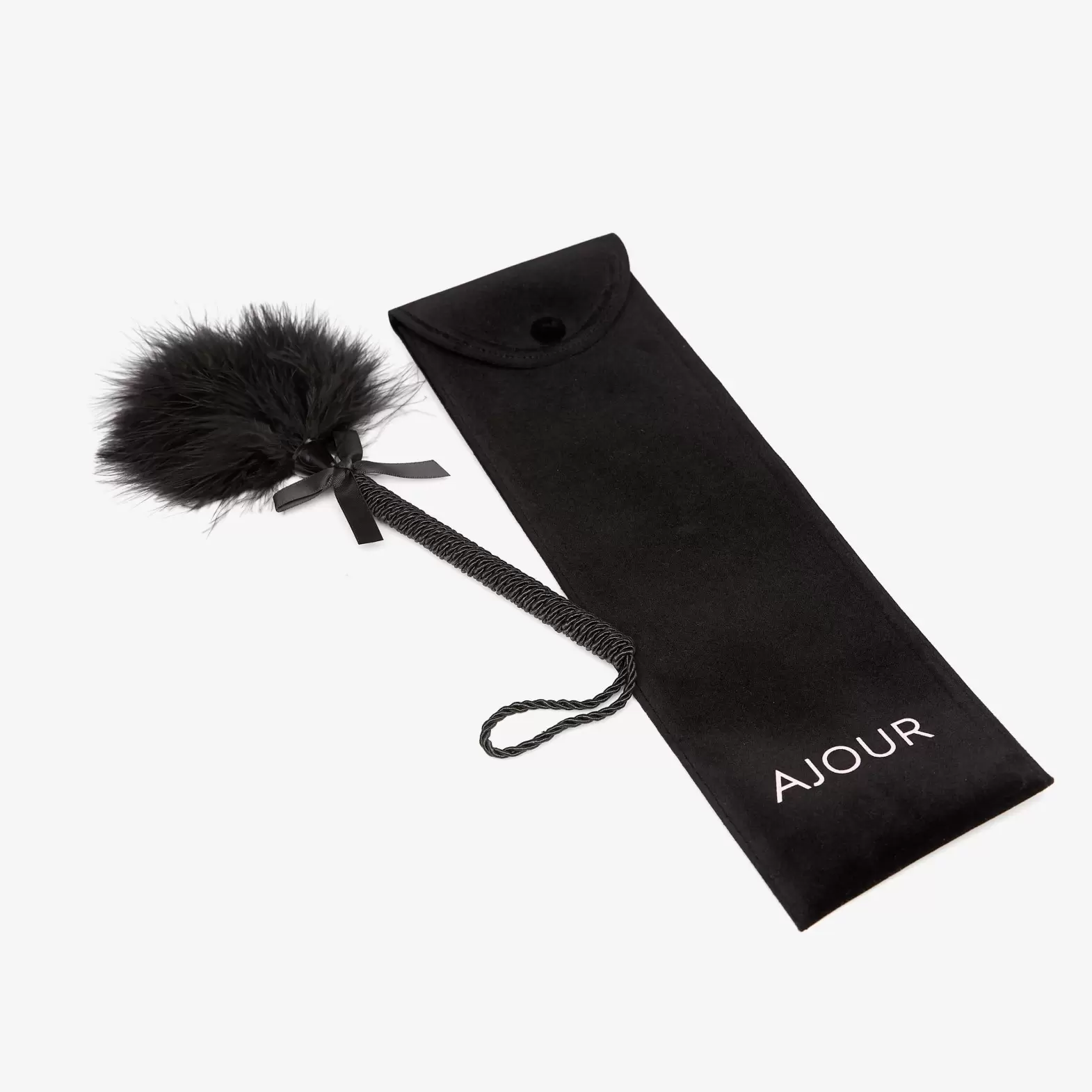 Feather pompom in a case