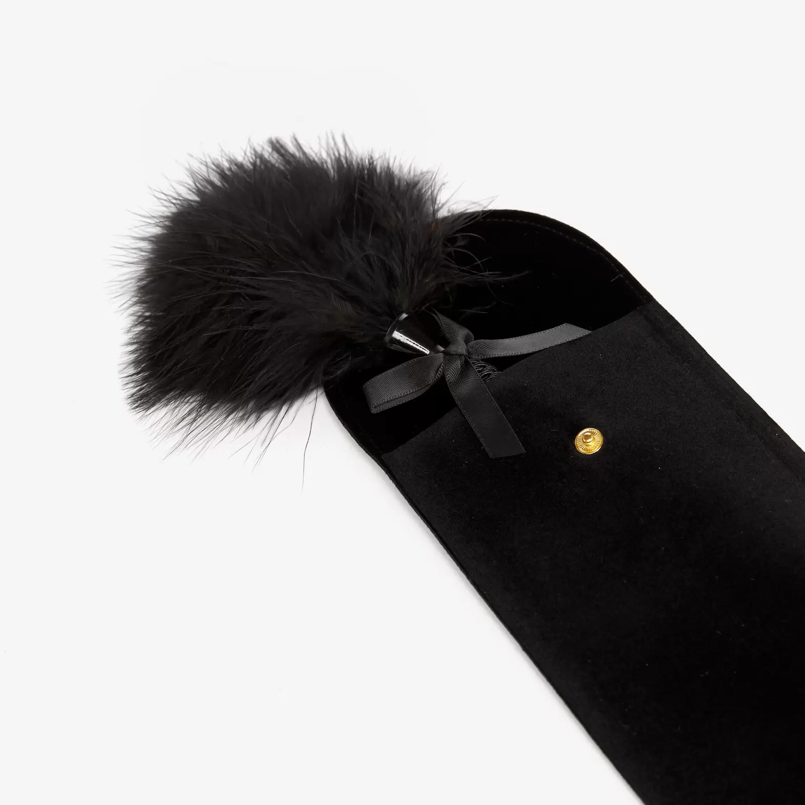 Feather pompom in a case