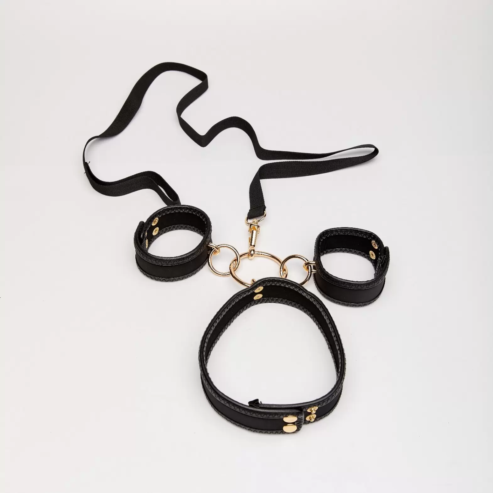 Set of handcuffs and collar with leash