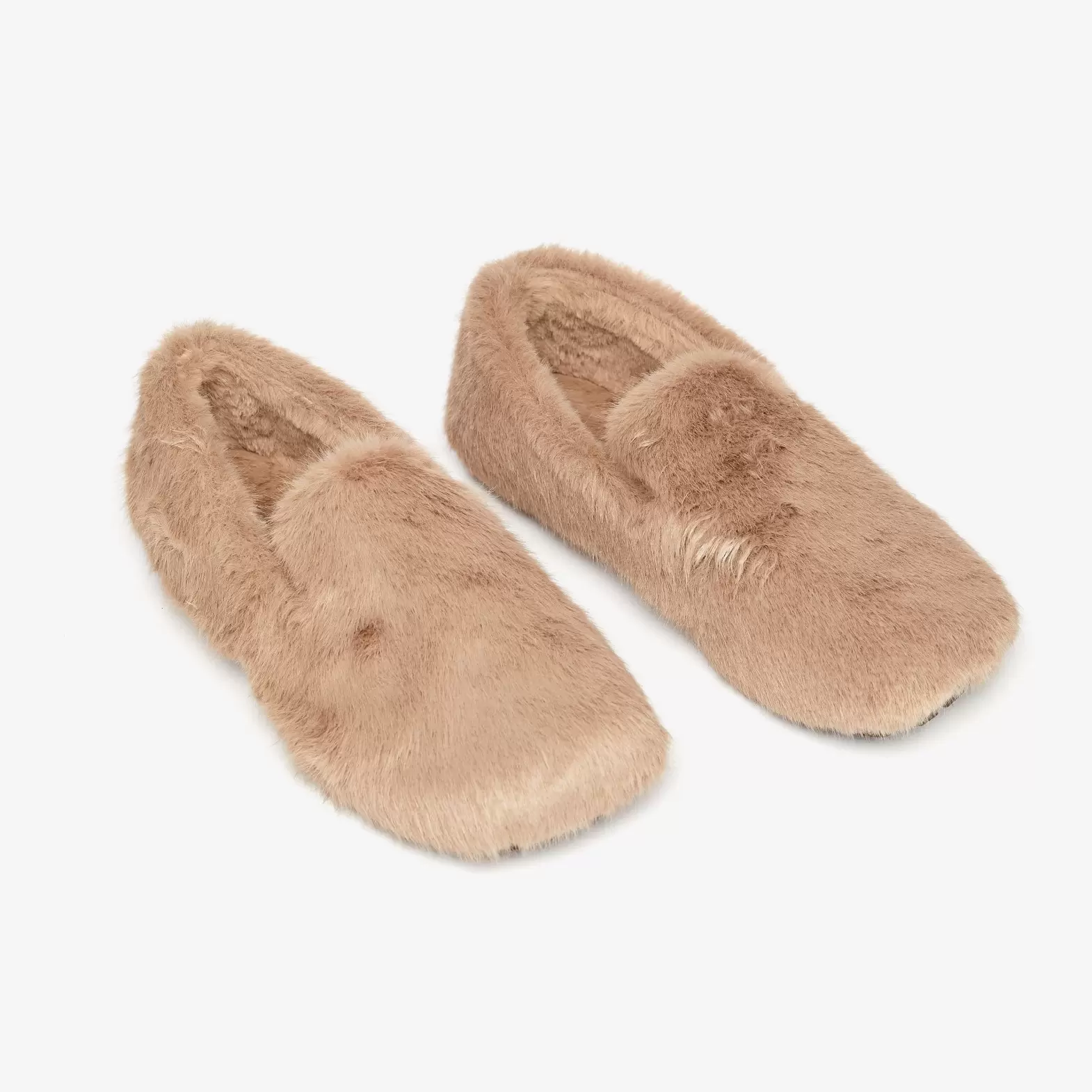 Homemade slippers made of artificial cocoa plush