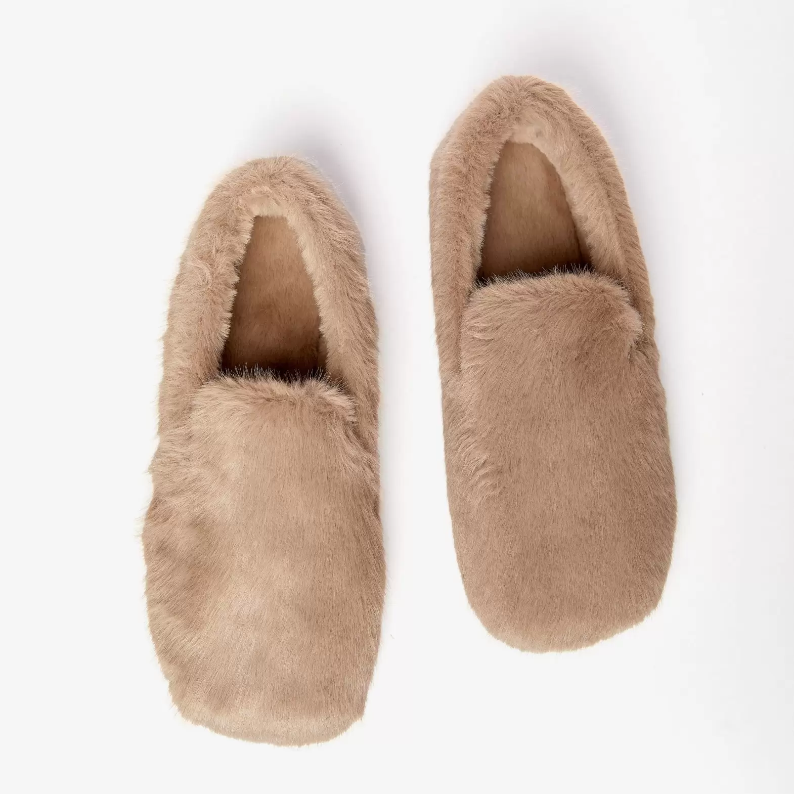 Homemade slippers made of artificial cocoa plush